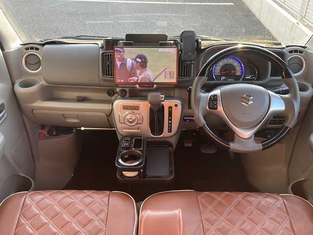 スズキ エブリィ ワゴン PZターボ スペシャル 東京都 2021(令3)年 5.6万km クールカーキPM 4WD/ターボ車/社外SDナビ　型式：CN-F1X10BLD/Bluetooth/フルセグTV/衝突被害軽減ブレーキ/車線逸脱警報装置/両側パワースライドドア/ETC/バックカメラ/プッシュスタート/スマートキー×2/シートヒーター/ドライブレコーダー/社外ステアリング（純正有り）/社外マフラー（純正有り）/社外フロントバンパー（純正有り）/社外テールランプ（純正有り）/スピーカー　/ルーフキャリア/マッドガード