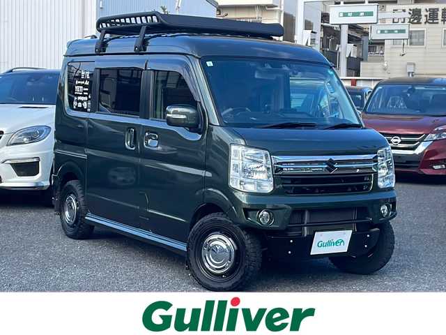 スズキ エブリィ ワゴン PZターボ スペシャル 東京都 2021(令3)年 5.6万km クールカーキPM 4WD/ターボ車/社外SDナビ　型式：CN-F1X10BLD/Bluetooth/フルセグTV/衝突被害軽減ブレーキ/車線逸脱警報装置/両側パワースライドドア/ETC/バックカメラ/プッシュスタート/スマートキー×2/シートヒーター/ドライブレコーダー/社外ステアリング（純正有り）/社外マフラー（純正有り）/社外フロントバンパー（純正有り）/社外テールランプ（純正有り）/スピーカー　/ルーフキャリア/マッドガード