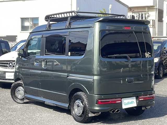 スズキ エブリィ ワゴン PZターボ スペシャル 東京都 2021(令3)年 5.6万km クールカーキPM 4WD/ターボ車/社外SDナビ　型式：CN-F1X10BLD/Bluetooth/フルセグTV/衝突被害軽減ブレーキ/車線逸脱警報装置/両側パワースライドドア/ETC/バックカメラ/プッシュスタート/スマートキー×2/シートヒーター/ドライブレコーダー/社外ステアリング（純正有り）/社外マフラー（純正有り）/社外フロントバンパー（純正有り）/社外テールランプ（純正有り）/スピーカー　/ルーフキャリア/マッドガード