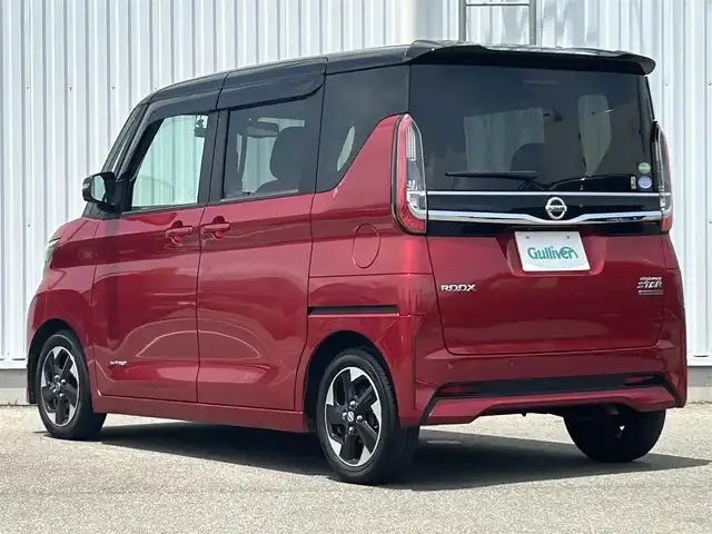 日産 ルークス HWS X プロパイロットED 愛媛県 2021(令3)年 5.1万km スパークリングレッド/ブラック 2トーン 日産360°セーフティアシスト/エマージェンシーブレーキ/プロパイロット/車線逸脱警報/車線逸脱防止支援システム/ハンドル支援/先行車発進お知らせ/速度標識表示/道路標識表示/ふらつき警報/クリアランスソナー前後/アダプティブLEDヘッドライトシステム/踏み間違い衝突防止アシスト/前方衝突予測警報/純正9インチナビゲーション/　CD/DVD/BT/フルセグ/MSV/iPod/AUX/　AppleCarPlay/AudroidAuto/アラウンドビューモニター/ビルドインETC/前後ドライブレコーダー/ステアリングスイッチ/スマートキー/プッシュスタート/LEDヘッドライト/フォグランプ/オートライト/両側ハンズフリーオートスライドドア/オートブレーキホールド/リヤシーリングファン/純正14インチAW/純正フロアマット/純正ドアバイザー/横滑り防止システム/電動格納ドアミラー