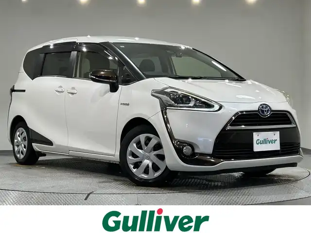 トヨタ シエンタ ハイブリッド G 愛知県 2016(平28)年 6.6万km ホワイトパールクリスタルシャイン 純正７型ＳＤナビ　/（Bluetooth/フルセグＴＶ/SD/FM/AM/HDMI)/純正１１型フリップダウンモニター　/トヨタセーフティセンス　/　　プリクラッシュセーフティ　/　　レーンディパーチャーアラート /　　オートマチックハイビーム/両側パワースライドドア　/シートヒーター　/ビルトインＥＴＣ　/前後ドライブレコーダー　/バックカメラ　/ＬＥＤヘッドライト/フォグランプ/純正フロアマット/プッシュスタート/　　-スマートキー