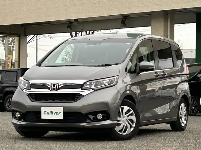 ホンダ フリード G ホンダセンシング 宮城県 2022(令4)年 2.9万km スーパープラチナグレーメタリック 1オーナー/ドラレコ//純正SDナビ（フルセグTV、DVD、CD、SD、BT、USB）//ETC//純正フロアマット//追従型クルコン//前席エアシート・シートヒーター//スペアキー//社外AW//純正鉄チン//ワイパーデアイサー//バックカメラ//両側パワースライド//レーントレーシングアシスト//オートライト//プリクラッシュセーフティ//横滑り防止機能