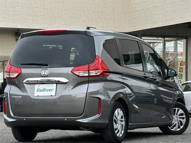ホンダ フリード G ホンダセンシング 宮城県 2022(令4)年 2.9万km スーパープラチナグレーメタリック 1オーナー/ドラレコ//純正SDナビ（フルセグTV、DVD、CD、SD、BT、USB）//ETC//純正フロアマット//追従型クルコン//前席エアシート・シートヒーター//スペアキー//社外AW//純正鉄チン//ワイパーデアイサー//バックカメラ//両側パワースライド//レーントレーシングアシスト//オートライト//プリクラッシュセーフティ//横滑り防止機能