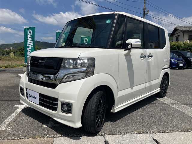 ホンダ Ｎ ＢＯＸ カスタムGターボSSブラッククタイル 広島県 2017(平29)年 3.7万km プレミアムホワイトパールⅡ 新車ワンオーナー/両側パワースライドドア/純正ナビ/バックカメラ/地デジTV/Bluetooth/無限グリル/社外センターマフラー/ハーフレザーシート/シティブレーキ/クルーズコントロール/パドルシフト/HIDヘッドライト/オートライト/前席シートヒーター/新車保証書/取扱説明書/スペアキー