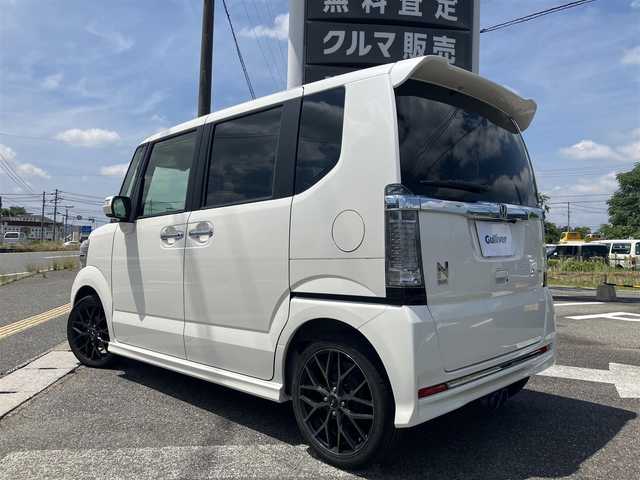 ホンダ Ｎ ＢＯＸ カスタムGターボSSブラッククタイル 広島県 2017(平29)年 3.7万km プレミアムホワイトパールⅡ 新車ワンオーナー/両側パワースライドドア/純正ナビ/バックカメラ/地デジTV/Bluetooth/無限グリル/社外センターマフラー/ハーフレザーシート/シティブレーキ/クルーズコントロール/パドルシフト/HIDヘッドライト/オートライト/前席シートヒーター/新車保証書/取扱説明書/スペアキー