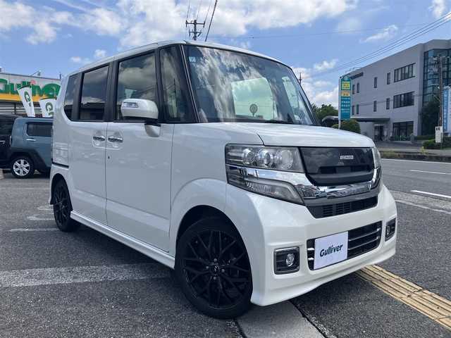 ホンダ Ｎ ＢＯＸ カスタムGターボSSブラッククタイル 広島県 2017(平29)年 3.7万km プレミアムホワイトパールⅡ 新車ワンオーナー/両側パワースライドドア/純正ナビ/バックカメラ/地デジTV/Bluetooth/無限グリル/社外センターマフラー/ハーフレザーシート/シティブレーキ/クルーズコントロール/パドルシフト/HIDヘッドライト/オートライト/前席シートヒーター/新車保証書/取扱説明書/スペアキー
