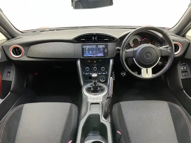 トヨタ ８６ GT 愛知県 2015(平27)年 9.5万km ピュアレッド 社外ナビ　バックカメラ　ＭＴ　禁煙車　フルセグＴＶ　ＤＶＤ　Ｂｌｕｅｔｏｏｔｈ　ＥＴＣ　クルーズコントロール　前後ドラレコ　オートライト　フォグランプ　純正１７インチアルミ　純正マット　スペアタイヤ