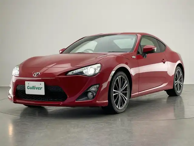 トヨタ ８６ GT 愛知県 2015(平27)年 9.5万km ピュアレッド 社外ナビ　バックカメラ　ＭＴ　禁煙車　フルセグＴＶ　ＤＶＤ　Ｂｌｕｅｔｏｏｔｈ　ＥＴＣ　クルーズコントロール　前後ドラレコ　オートライト　フォグランプ　純正１７インチアルミ　純正マット　スペアタイヤ