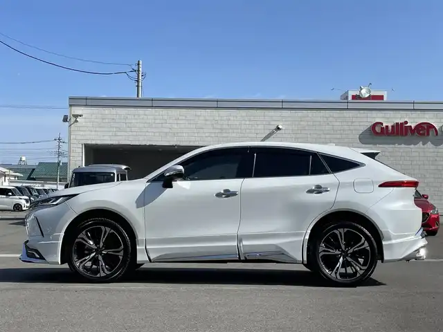 トヨタ ハリアー ハイブリッド Z レザーパッケージ 群馬県 2023(令5)年 1.1万km プラチナホワイトパールマイカ モデリスタフルエアロ　/モデリスタ２０インチＡＷ　/ＪＢＬサウンド　/純正ナビ・フルセグ・ＡｐｐｌｅＣａｒＰｌａｙ　/デジタルインナーミラー　/全周囲カメラ　/シートエアコン　/ハンドルヒーター　/ウェルカムライト/黒レザーシート/トヨタセーフティセンス/純正マット/純正AW車載