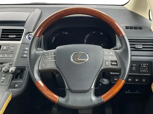 レクサス ＨＳ 250h バージョンI 新潟県 2010(平22)年 5.2万km ホワイトパールクリスタルシャイン 純正ＨＤＤナビ（CD・MD・USB・DVD）/レザーシート　/バックフロントカメラ　/前席パワーシート/前席シートヒーター/前席エアシート　/メモリーシート　/前後コーナーセンサー　/クルーズコントロール　/フルセグ　/オートライト/純正ビルトインETC　/アイドリングストップ/ウッドコンビステアリング/ステアリングリモコン/コーナーポール/リアサンシェード/スマートキー/スペアキー/純正フロアマット/純正１７インチアルミホイール