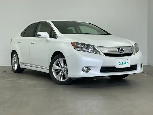 レクサス ＨＳ 250h バージョンI 新潟県 2010(平22)年 5.2万km ホワイトパールクリスタルシャイン 純正ＨＤＤナビ（CD・MD・USB・DVD）/レザーシート　/バックフロントカメラ　/前席パワーシート/前席シートヒーター/前席エアシート　/メモリーシート　/前後コーナーセンサー　/クルーズコントロール　/フルセグ　/オートライト/純正ビルトインETC　/アイドリングストップ/ウッドコンビステアリング/ステアリングリモコン/コーナーポール/リアサンシェード/スマートキー/スペアキー/純正フロアマット/純正１７インチアルミホイール