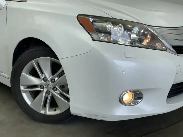 レクサス ＨＳ 250h バージョンI 新潟県 2010(平22)年 5.2万km ホワイトパールクリスタルシャイン 純正ＨＤＤナビ（CD・MD・USB・DVD）/レザーシート　/バックフロントカメラ　/前席パワーシート/前席シートヒーター/前席エアシート　/メモリーシート　/前後コーナーセンサー　/クルーズコントロール　/フルセグ　/オートライト/純正ビルトインETC　/アイドリングストップ/ウッドコンビステアリング/ステアリングリモコン/コーナーポール/リアサンシェード/スマートキー/スペアキー/純正フロアマット/純正１７インチアルミホイール