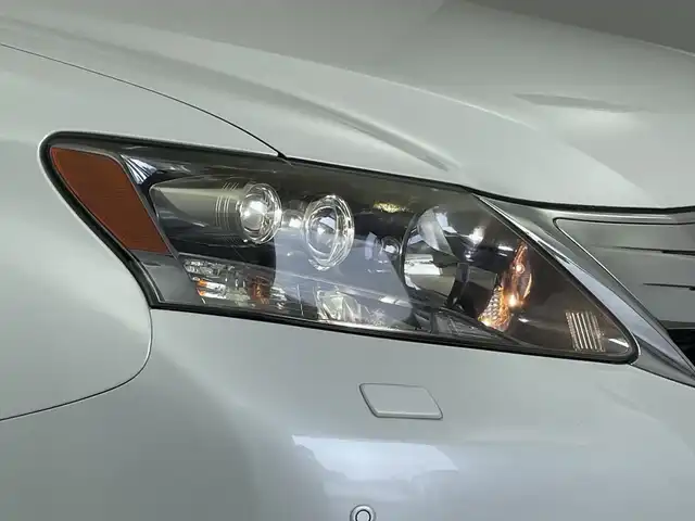 レクサス ＨＳ 250h バージョンI 新潟県 2010(平22)年 5.2万km ホワイトパールクリスタルシャイン 純正ＨＤＤナビ（CD・MD・USB・DVD）/レザーシート　/バックフロントカメラ　/前席パワーシート/前席シートヒーター/前席エアシート　/メモリーシート　/前後コーナーセンサー　/クルーズコントロール　/フルセグ　/オートライト/純正ビルトインETC　/アイドリングストップ/ウッドコンビステアリング/ステアリングリモコン/コーナーポール/リアサンシェード/スマートキー/スペアキー/純正フロアマット/純正１７インチアルミホイール