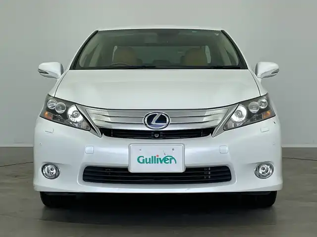 レクサス ＨＳ 250h バージョンI 新潟県 2010(平22)年 5.2万km ホワイトパールクリスタルシャイン 純正ＨＤＤナビ（CD・MD・USB・DVD）/レザーシート　/バックフロントカメラ　/前席パワーシート/前席シートヒーター/前席エアシート　/メモリーシート　/前後コーナーセンサー　/クルーズコントロール　/フルセグ　/オートライト/純正ビルトインETC　/アイドリングストップ/ウッドコンビステアリング/ステアリングリモコン/コーナーポール/リアサンシェード/スマートキー/スペアキー/純正フロアマット/純正１７インチアルミホイール