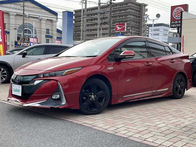 トヨタ プリウス ＰＨＶ A レザーパッケージ 鳥取県 2018(平30)年 11万km エモーショナルレッド ワンオーナー/モデリスタエアロ/レザーシート/プリクラッシュセーフティ/レーンデパーチャーアラート/ブラインドスポットモニタリング/インテリジェントソナー/オートハイビーム/ドライブレコーダー/パーキングアシスト/クルーズコントロール/メーカーOPナビゲーション/フルセグ・Bluetooth/バックカメラ/前席パワーシート/シートヒーター/LEDヘッドライト/置くだけ充電/ビルトインETC/保証書・取説