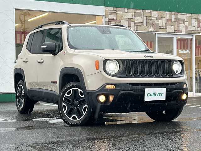 クライスラー・ジープ ジープ レネゲード トレイルホーク 徳島県 2017(平29)年 8.6万km ベージュ 社外8型ナビ　AVIC-RL900/（ラジオ/DISC/USB/フルセグ/BT）/バックカメラ/ビルトインETC/クルーズコントロール/前後コーナーセンサー/LEDヘッドライト/純正17インチアルミホイール/ステアリングリモコン/自動パーキングブレーキ/フォグライト/ルーフレール/純正フロアマット/スペアキー/プッシュスタート