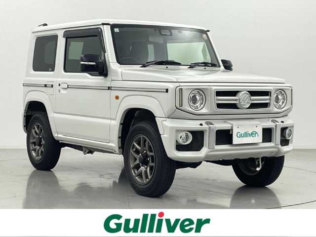 スズキ ジムニー XC 熊本県 2021(令3)年 4万km ピュアホワイトP ＤＡＭＤｌｉｔｔｌｅＧ　ＳＴＡＮＤＡＲＤコンプリートキット/4WD/社外ナビMDV-D306W（ＣＤ・ＤＶＤ・フルセグ・ＢＴ）/バックカメラ　/社外前方ドライブレコーダー　/クルーズコントロール/ビルトインＥＴＣ　/前席シートヒーター　　/衝突軽減ブレーキ　/横滑り防止/ダウンヒルアシスト/ミラーヒーター/オートライト/LEDヘッドライト/フォグライト/スマートキー/プッシュスタート/スペアキー１本/保証書/取扱説明書