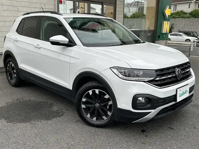 フォルクスワーゲン ＶＷ Ｔ－クロス TSI アクティブ 埼玉県 2021(令3)年 6万km ピュアホワイト ワンオーナー/純正メモリナビ(AM/FM/Bluetooth)/バックカメラ/純正ビルトインETC2.0/クルーズコントロール追従有/パークディスタンスコントロール/パーキングアシスト/アイドリングストップ/コーナーセンサー前後/オートライト/オートエアコン/プッシュスタートボタン/スマートキー×1/パワーステアリング/パワーウィンドウ/ルーフレール/本革巻きステアリング/純正16インチアルミホイール/12V充電器/純正フロアマット/ステアリングリモコン/トノカバー/車両取扱説明書/保証書