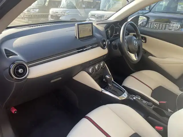 マツダ デミオ 13S ツーリング Lパッケージ 群馬県 2016(平28)年 3.9万km スモーキーローズマイカ (株)IDOMが運営する【じしゃロン伊勢崎店】の自社ローン専用車両になりますこちらは現金またはオートローンご利用時の価格です。自社ローンご希望の方は別途その旨お申付け下さい/純正SDナビ/・FM AM CD/DVD Bluetooth USB AUX aha /フルセグTV/バックカメラ/アイドリングストップ/ETC/ドライブレコーダー/純正フロアマット/ハーフレザー/シートヒーター(D/N席)/純正15インチアルミホイール/横滑り防止装置/レーンキープアシスト/盗難防止装置/オートライト/オートマチックハイビーム/ダブル＋サイドエアバッグ/衝突被害軽減システム/取扱説明書/保証書