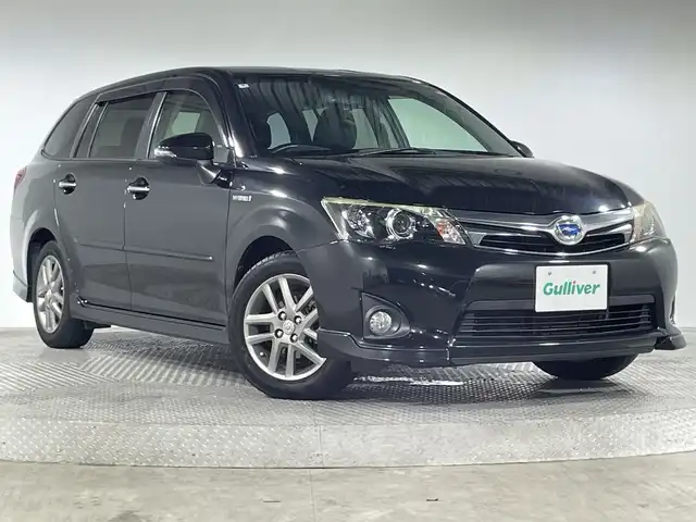 トヨタ カローラ フィールダー HV G エアロツアラー W×B 神奈川県 2014(平26)年 5.6万km ブラックマイカ 純正ナビ/・BT/フルセグTV/CD/DVD/SD/HDD/バックカメラ/革巻きステアリング/ステアリングスイッチ/Autoライト/nanoeエアコン/ECOモード/ビルトインETC/スマートキー/スペアキー/プッシュスタートボタン/LEDヘッドライト/フォグランプ/電動格納ミラー/ウィンカーミラー/純正フロアマット/純正ドアバイザー/純正アルミホイール
