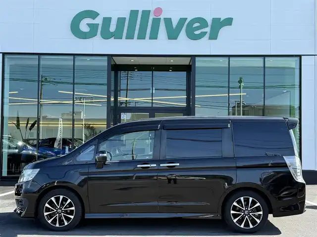 ホンダ ステップワゴン スパーダ Z クールスピリット 栃木県 2012(平24)年 8.4万km プレミアムスパークルブラックパール 社外8インチナビ/フルセグTV走行中OK/DVD再生機能/Bluetoothオーディオ/バックカメラ/ステアリングリモコン/リモコン付きフリップダウンモニター/両側パワスラ/ビルトインETC/パドルシフト/ハーフレザーシート/スマートキー×2