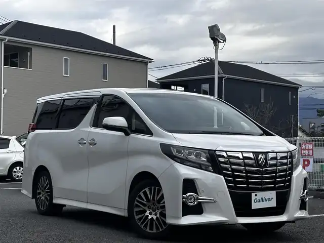 トヨタ アルファード SA Cパッケージ 静岡県 2017(平29)年 15.2万km ホワイトパールクリスタルシャイン ~JBLサウンド~/ユーザー買取車両/純正メーカーOPナビ/　【CD/DVD/BT/地デジフルセグTV】/純正18インチAW/純正LEDヘッドライト/純正フリップダウンモニター/黒本革シート/シートヒーター/Wサンルーフ/全方位カメラ/レーダークルーズコントロール/プリクラッシュセーフティシステム/ビルトインETC2.0/ウッドコンビステアリング/両側パワースライドドア/パワーバックドア/ステアリングヒーター/2列目オットマン/電動パーキングブレーキ/オートホールド/新車時保証書/取扱説明書/スペアキー×1