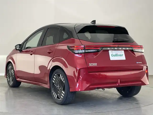 日産 オーラ G 愛知県 2024(令6)年 0.2万km ガーネットレッド/スーパーブラック 2トーン 純正９型ナビ　フルセグＴＶ　ＨＤＭＩ　プロパイロット　ＢＯＳＥサウンド　デジタルインナーミラー　前後ドラレコ　ワイヤレス充電　シートヒーター　ＬＥＤライト　衝突軽減　追従クルコン　コーナーセンサ　電動パーキング　フォグランプ　ステアリングヒーター　ETC2.0　禁煙車