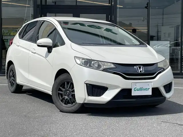 ホンダ フィット 13G Lパッケージ 茨城県 2014(平26)年 9万km プレミアムホワイトパール 純正ナビ/【CD・DVD・ラジオ・TV・iPod・SD・USB・BT・VTR・AUX】/ETC/Bカメラ/アイドリングストップ/ステリモ/オートライト/LEDライト/オートエアコン/スマートキー/プッシュスタート/純正フロアマット/社外アルミホイール