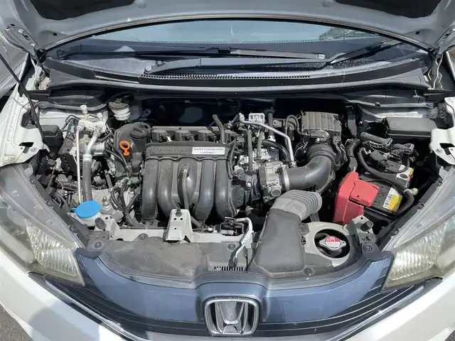 ホンダ フィット 13G Lパッケージ 茨城県 2014(平26)年 9万km プレミアムホワイトパール 純正ナビ/【CD・DVD・ラジオ・TV・iPod・SD・USB・BT・VTR・AUX】/ETC/Bカメラ/アイドリングストップ/ステリモ/オートライト/LEDライト/オートエアコン/スマートキー/プッシュスタート/純正フロアマット/社外アルミホイール