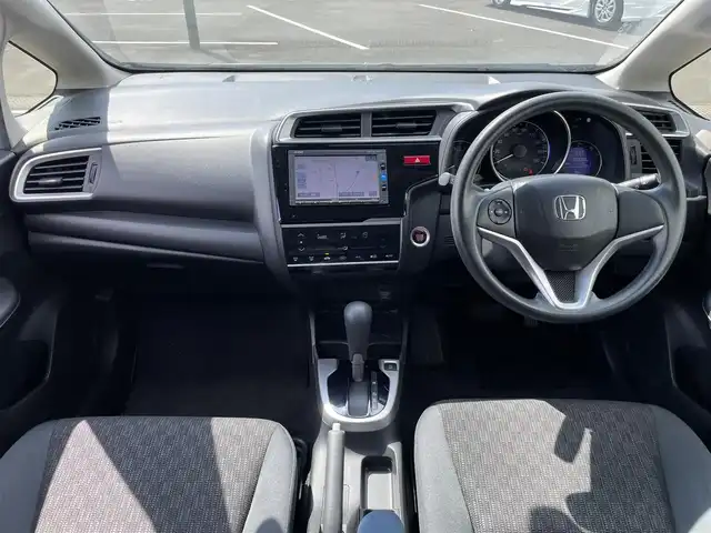 ホンダ フィット 13G Lパッケージ 茨城県 2014(平26)年 9万km プレミアムホワイトパール 純正ナビ/【CD・DVD・ラジオ・TV・iPod・SD・USB・BT・VTR・AUX】/ETC/Bカメラ/アイドリングストップ/ステリモ/オートライト/LEDライト/オートエアコン/スマートキー/プッシュスタート/純正フロアマット/社外アルミホイール