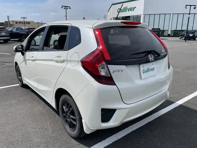 ホンダ フィット 13G Lパッケージ 茨城県 2014(平26)年 9万km プレミアムホワイトパール 純正ナビ/【CD・DVD・ラジオ・TV・iPod・SD・USB・BT・VTR・AUX】/ETC/Bカメラ/アイドリングストップ/ステリモ/オートライト/LEDライト/オートエアコン/スマートキー/プッシュスタート/純正フロアマット/社外アルミホイール