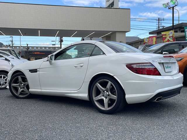 メルセデス・ベンツ ＳＬＫ２００ レーダーセーフティエディション 大阪府 2013(平25)年 1.5万km 白 メーカーHDDナビ/　CD.DVD.BT.フルセグTV/レザーシート/シートヒーター/ベンチレーション/メモリー機能付パワーシート/パドルシフト/HIDライト/ドライブレコーダー/ETC/バックカメラ/社外レーダー/レザーステアリング/ステアリングスイッチ/クルーズコントロール/純正フロアマット/保証書/スペアキー有