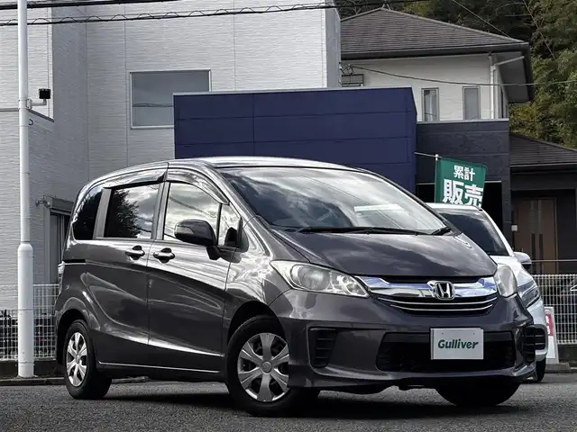 ホンダ フリード G プレミアムエディション 熊本県 2015(平27)年 8.4万km モダンスティールM 純正ナビ（VXM-152VFi）/【フルセグTV/Bluetooth/CD/DVD】/バックカメラ/両側パワースライドドア/クルーズコントロール/ビルトインETC/オートライト/ウィンカーミラー/ステアリングスイッチ/純正フロアマット/純正ドアバイザー/横滑り防止/盗難防止装置/保証書/取扱説明書