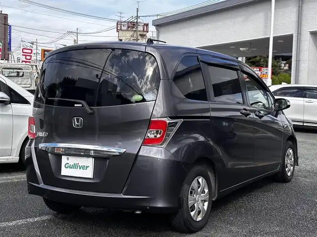 ホンダ フリード G プレミアムエディション 熊本県 2015(平27)年 8.4万km モダンスティールM 純正ナビ（VXM-152VFi）/【フルセグTV/Bluetooth/CD/DVD】/バックカメラ/両側パワースライドドア/クルーズコントロール/ビルトインETC/オートライト/ウィンカーミラー/ステアリングスイッチ/純正フロアマット/純正ドアバイザー/横滑り防止/盗難防止装置/保証書/取扱説明書