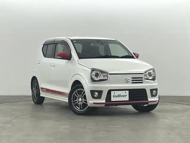 スズキ アルト ターボRS 福島県 2015(平27)年 9.5万km パールホワイト 安全装備/・衝突軽減/・誤発進抑制機能/・エマージェンシーストップシグナル/純正ナビ/・型番：KXM-E507W/・フルセグ/BT/SD/CD/DVD/FM/AM/・バックカメラ/・ETC/前後ドライブレコーダー/ターボタイマー/革巻きステアリング/・ステアリングスイッチ/・パドルシフト/前席シートヒーター/・シートカバー/ＨＩＤヘッドライト/・フォグランプ/・オートライト/スマートキー/・プッシュスタート/電動格納ミラー/・ウィンカーミラー/純正フロアマット/純正ドアバイザー