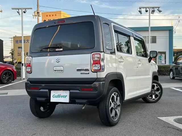 スズキ ハスラー HYBRID X 愛媛県 2022(令4)年 2.7万km ピュアホワイトパール/ガンメタリック2トーン 登録時走行距離：26335km/メーカーOP純正ナビ/AM/FM/フルセグTV/前後ドラレコ/ビルトインETC/全周囲カメラ/クルコン/レーンキープアシスト/衝突軽減システム/横滑り防止装置/盗難防止装置/LEDヘッドライト/フォグランプ/オートライト/エンジンスタートボタン/スマートキー/スペアキー/純正アルミホイール/純正フロアマット