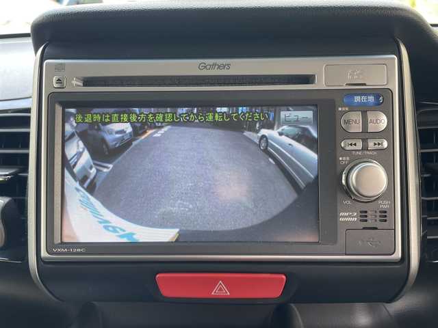 ホンダ Ｎ ＢＯＸ ＋ カスタム G 静岡県 2013(平25)年 8万km ポリッシュドメタルメタリック リヤスロープ/純正ナビ/CD/SD/USB/バックカメラ/左後パワースライドドア/右後イージークローザー/ETC/HIDヘッドライト/バックソナー/ステアリングスイッチ/スマートキー×2/保証書/取扱説明書/ナビ取扱説明書/R6点検記録簿有
