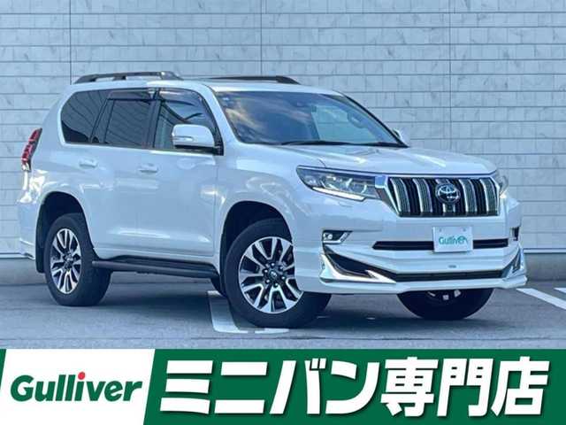 トヨタ ランドクルーザー プラド TX Lパッケージ 福岡県 2023(令5)年 2.3万km ホワイトパールクリスタルシャイン 純正9型ナビ(フルセグTV/BT）モデリスタエアロサンルーフ全方位モニタートヨタセーフティーセンスブラインドスポットモニターシートエアコン2.0ETCレーダークルコン前後ドラレココーナーセンサーUSBポート純正LEDヘットライト純正19インチアルミホイール純正フロアマットスマートキープッシュスタート