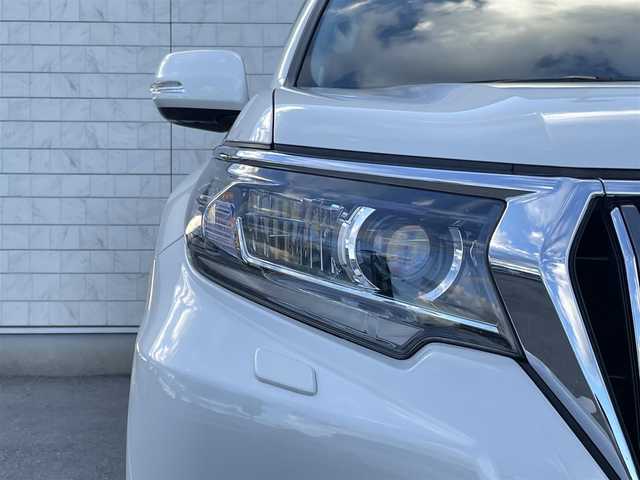 トヨタ ランドクルーザー プラド TX Lパッケージ 福岡県 2023(令5)年 2.3万km ホワイトパールクリスタルシャイン 純正9型ナビ(フルセグTV/BT）モデリスタエアロサンルーフ全方位モニタートヨタセーフティーセンスブラインドスポットモニターシートエアコン2.0ETCレーダークルコン前後ドラレココーナーセンサーUSBポート純正LEDヘットライト純正19インチアルミホイール純正フロアマットスマートキープッシュスタート