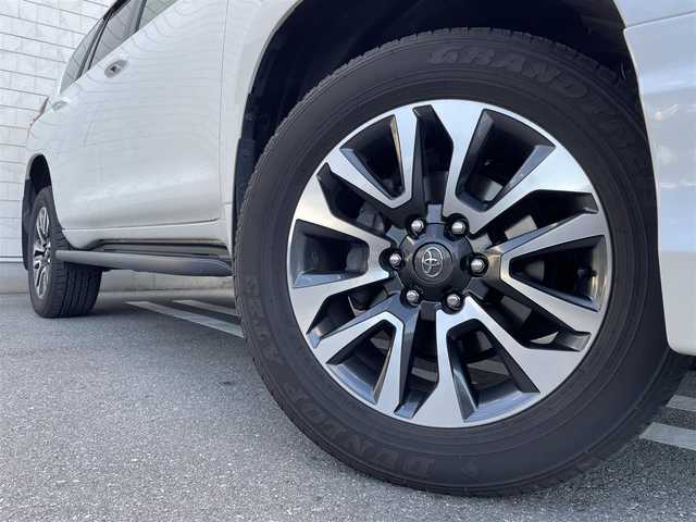 トヨタ ランドクルーザー プラド TX Lパッケージ 福岡県 2023(令5)年 2.3万km ホワイトパールクリスタルシャイン 純正9型ナビ(フルセグTV/BT）モデリスタエアロサンルーフ全方位モニタートヨタセーフティーセンスブラインドスポットモニターシートエアコン2.0ETCレーダークルコン前後ドラレココーナーセンサーUSBポート純正LEDヘットライト純正19インチアルミホイール純正フロアマットスマートキープッシュスタート