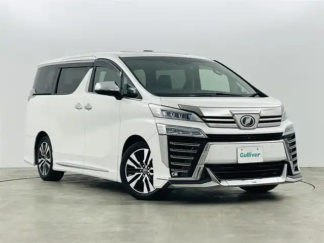 トヨタ ヴェルファイア Z Gエディション 福島県 2018(平30)年 2.9万km ホワイトパールクリスタルシャイン トヨタセーフティセンス/・レーンディパーチャーアラート/・レーントレーシングアシスト/・レーンチェンジアシスト（LCA）/・レーダークルーズコントロール/・先行車発進アラーム/・ロードサインアシスト/・プリクラッシュセーフティ/・プロアクティブドライビングアシスト（PDA）/・オートマチックハイビーム/ブラインドスポットモニター/純正ナビ/・フルセグ/CD/DVD/SD/USB/BT/AUX/AM/FM/・マルチビューカメラシステム/・ビルトインETC2.0/ＪＢＬサウンドシステム/純正フリップダウンモニター/デジタルインナーミラー/コンビステアリング/・ステアリングスイッチ/・ステアリングヒーター/１００V電源/LEDヘッドライト/・LEDフォグランプ/・オートライト/レザーシート/・D席パワーシート/・前席シートヒーター/・前席ベンチレーションシート/両側パワースライドドア/・後席サンシェード/パワーリアゲート/モデリスタエアロ/電動パーキングブレーキ/・ブレーキホールド/電動格納ミラー/・ウィンカーミラー/純正フロアマット/ドアバイザー/プッシュスタート/・スマートキー