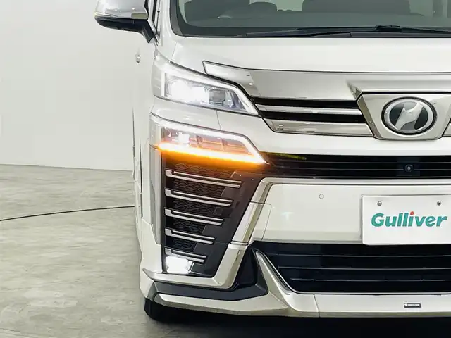 トヨタ ヴェルファイア Z Gエディション 福島県 2018(平30)年 2.9万km ホワイトパールクリスタルシャイン トヨタセーフティセンス/・レーンディパーチャーアラート/・レーントレーシングアシスト/・レーンチェンジアシスト（LCA）/・レーダークルーズコントロール/・先行車発進アラーム/・ロードサインアシスト/・プリクラッシュセーフティ/・プロアクティブドライビングアシスト（PDA）/・オートマチックハイビーム/ブラインドスポットモニター/純正ナビ/・フルセグ/CD/DVD/SD/USB/BT/AUX/AM/FM/・マルチビューカメラシステム/・ビルトインETC2.0/ＪＢＬサウンドシステム/純正フリップダウンモニター/デジタルインナーミラー/コンビステアリング/・ステアリングスイッチ/・ステアリングヒーター/１００V電源/LEDヘッドライト/・LEDフォグランプ/・オートライト/レザーシート/・D席パワーシート/・前席シートヒーター/・前席ベンチレーションシート/両側パワースライドドア/・後席サンシェード/パワーリアゲート/モデリスタエアロ/電動パーキングブレーキ/・ブレーキホールド/電動格納ミラー/・ウィンカーミラー/純正フロアマット/ドアバイザー/プッシュスタート/・スマートキー