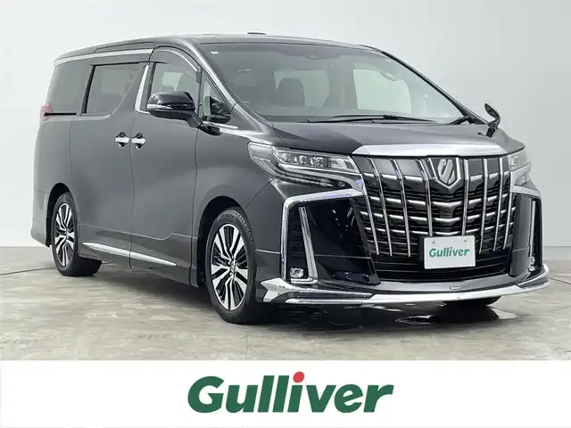 トヨタ アルファード S Cパッケージ 千葉県 2021(令3)年 6万km ブラック 禁煙車/サンルーフ/両側パワースライドドア/モデリスタエアロ/トヨタセーフティーセンス/・プリクラッシュセーフティ/・レーントレーシングアシスト/・パーキングサポートブレーキ/・ロードサインアシスト/・ブラインドスポットモニター/・オートマチックハイビーム/・リヤクロストラフィックアラート/純正10.5インチナビ/・CD/DVD/フルセグTV/Bluetooth/バックカメラ/デジタルインナーミラー/レザーシート/メモリ式パワーシート/シートヒーター/エアシート/オットマン/ステアリングヒーター/電動パーキングブレーキ/オートブレーキホールド/ビルトインETC/パワーバックドア/社外フロアマット/純正18インチアルミホイール/プッシュスタート/スマートキー