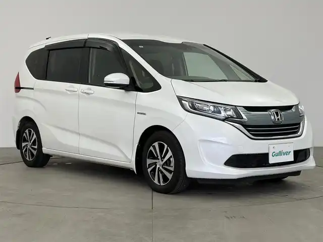 ホンダ フリード ハイブリット EX 愛知県 2019(平31)年 3.4万km ホワイトオーキッドパール 純正ナビ　/バックカメラ　/衝突軽減ブレーキ　/レーダークルーズ　/ワイパーデアイザー　/シートヒーター　/ハーフレザーシート　/ＥＴＣ/ドラレコ　/両側パワースライドドア　/LEDオートライト　/純正アルミホイール/スマートキー