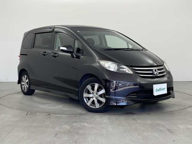 ホンダ フリード Gエアロ 兵庫県 2011(平23)年 9.2万km プレミアムブラキッシュパール ・社外ナビ＆TV＆BT＆DVD＆CD/・バックカメラ/・両側パワースライドドア/・ETC/・スマートキー/・スペアキー/・純正15インチアルミホイール/・フロアマット/・ドアバイザー/・ディスチャージヘッドライト/・オートライト/・電動格納ミラー/・ドアミラーウインカー/・ＥＣＯＮ