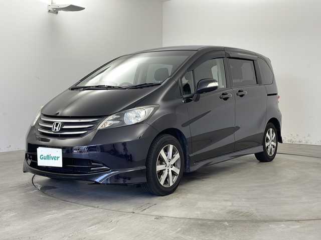 ホンダ フリード Gエアロ 兵庫県 2011(平23)年 9.2万km プレミアムブラキッシュパール ・社外ナビ＆TV＆BT＆DVD＆CD/・バックカメラ/・両側パワースライドドア/・ETC/・スマートキー/・スペアキー/・純正15インチアルミホイール/・フロアマット/・ドアバイザー/・ディスチャージヘッドライト/・オートライト/・電動格納ミラー/・ドアミラーウインカー/・ＥＣＯＮ
