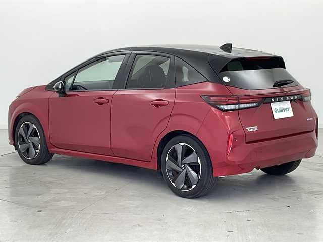 日産 オーラ G 宮城県 2022(令4)年 6.2万km ガーネットレッド/スーパーブラック 2トーン プロパイロット/車線逸脱警報/アダプティブヘッドライト/ブラインドスポットモニター/ＢＯＳＥサウンド/純正９型ナビ/BT.USB.HDMI/全周囲カメラ/フルセグTV/ＥＴＣ２．０/デジタルインナーミラー/ドラレコF/革巻ステアリング/ステアリングスイッチ/電動パーキングブレーキ/プッシュスタート/スマートキー/純正フロアマッド/ハーフレザーシート/純正１７インチAW/LEDヘッドライト/LEDフォグランプ/横滑り防止機能