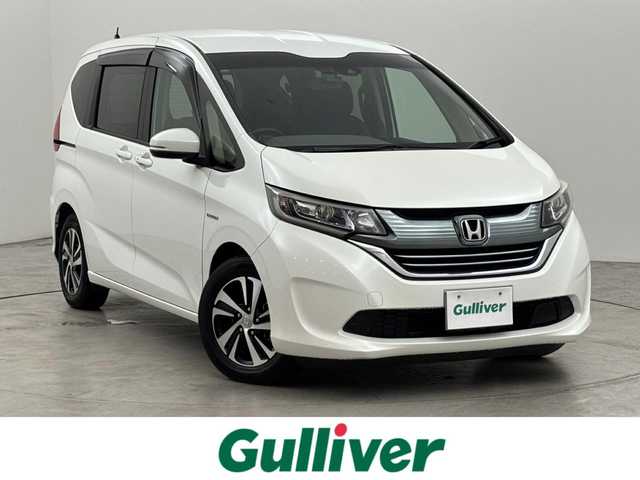 ホンダ フリード＋ ハイブリット EX 福岡県 2018(平30)年 6.1万km ホワイトオーキッドパール 純正ナビ　/デジタルルームミラー　/両側パワースライドドア　/ＥＴＣ　/ドライブレコーダー　/バックカメラ　/レーダークルーズコントロール　/衝突軽減被害システム　/レーンキープ　/シートヒーター　/純正１５インチＡＷ