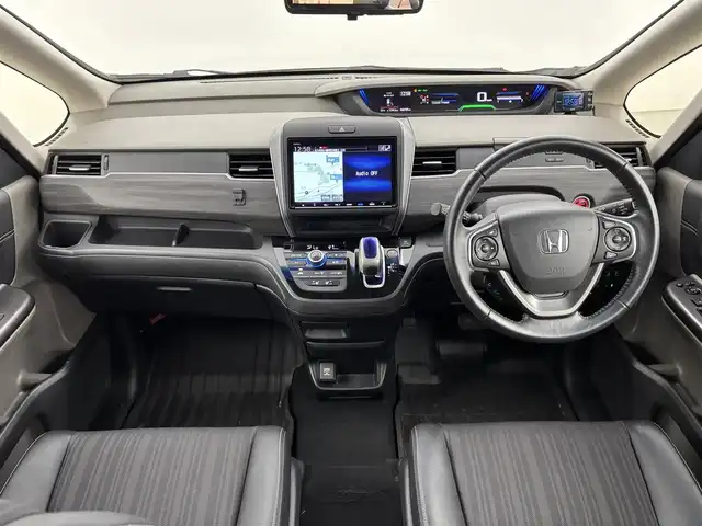 ホンダ フリード＋ ハイブリット EX 福岡県 2018(平30)年 6.1万km ホワイトオーキッドパール 純正ナビ　/デジタルルームミラー　/両側パワースライドドア　/ＥＴＣ　/ドライブレコーダー　/バックカメラ　/レーダークルーズコントロール　/衝突軽減被害システム　/レーンキープ　/シートヒーター　/純正１５インチＡＷ