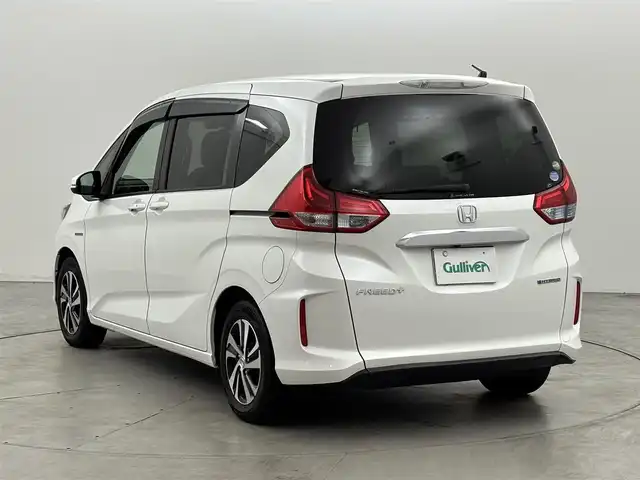 ホンダ フリード＋ ハイブリット EX 福岡県 2018(平30)年 6.1万km ホワイトオーキッドパール 純正ナビ　/デジタルルームミラー　/両側パワースライドドア　/ＥＴＣ　/ドライブレコーダー　/バックカメラ　/レーダークルーズコントロール　/衝突軽減被害システム　/レーンキープ　/シートヒーター　/純正１５インチＡＷ